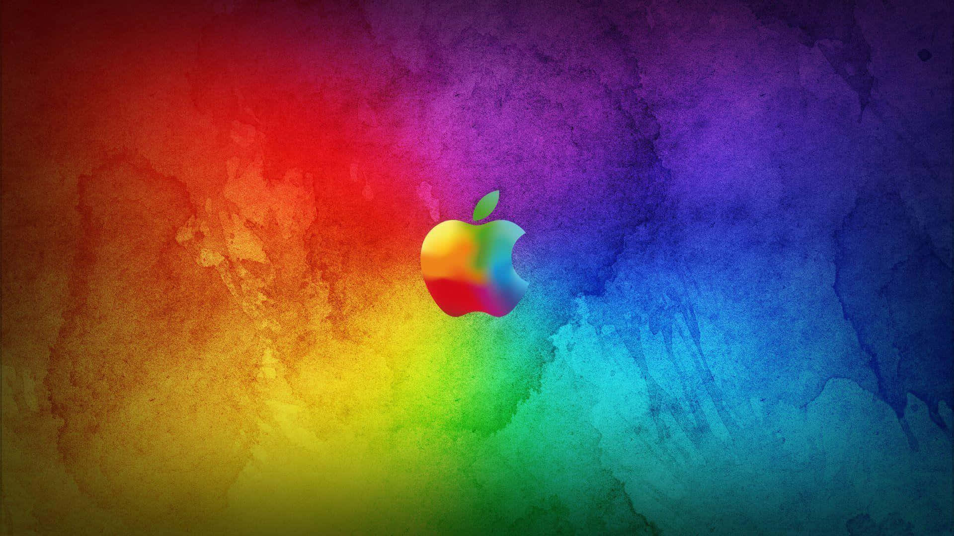 Gradient 桌布 壁紙 — 一個充滿活力的彩虹水彩潑濺，中心有一個色彩繽紛的Apple標誌，背景為紋理漸變。