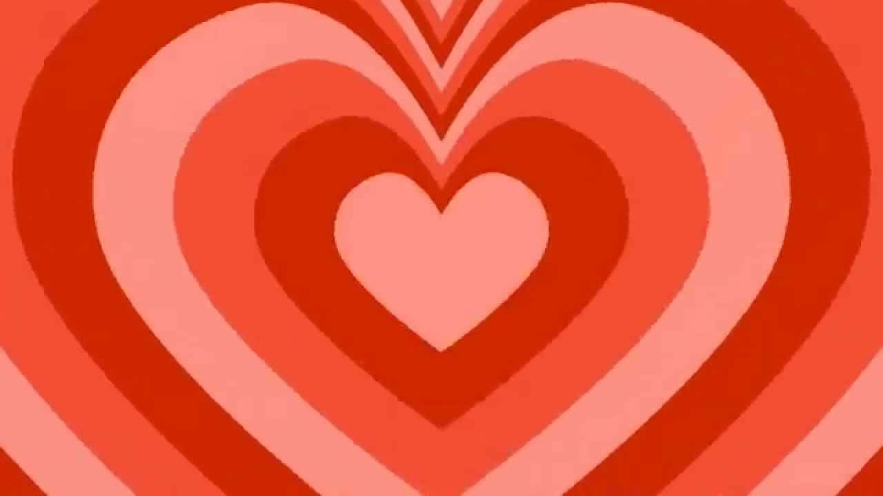 桌布 壁紙 — 一個充滿活力的復古風格圖案，由紅色和粉紅色漸層的同心愛心向外輻射。