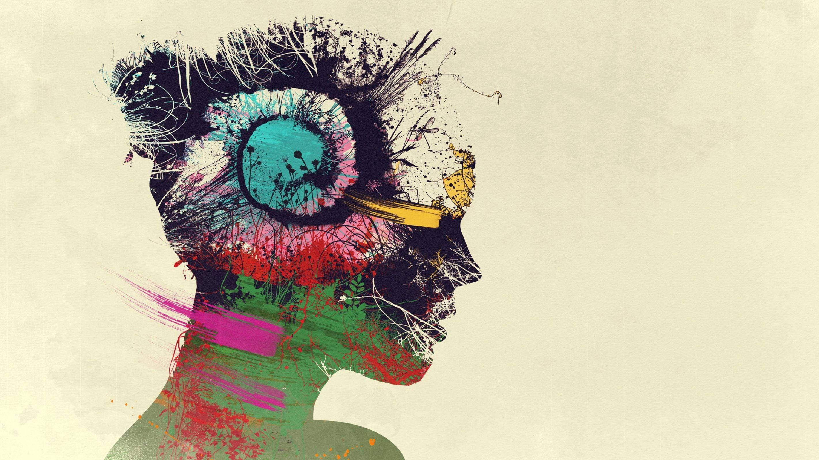 藝術 桌布 壁紙 — 一個充滿活力的抽象側面人頭剪影，帶有彩色油漆飛濺和一個藍綠色的眼睛形狀。