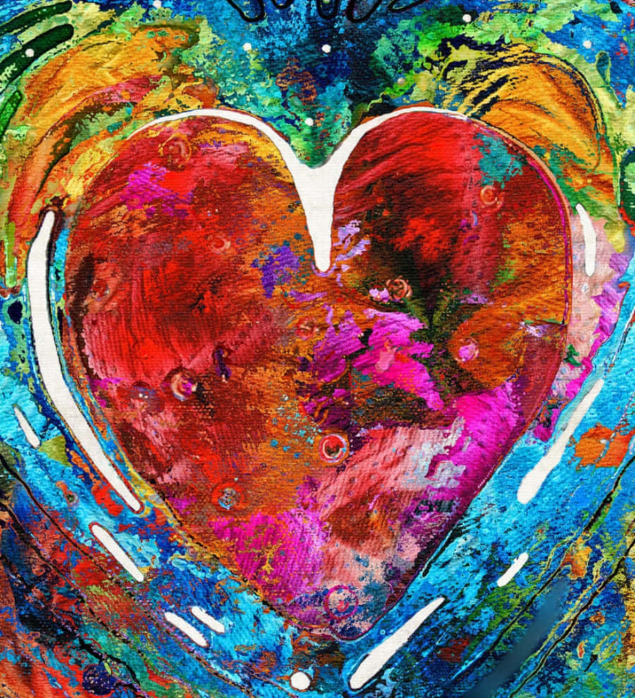 Heart Art 桌布 壁紙 — 一個充滿活力的抽象心臟，以鮮明的紅色、粉紅色和橙色繪製，周圍環繞著旋轉的藍色、綠色和黃色，並帶有白色筆觸。
