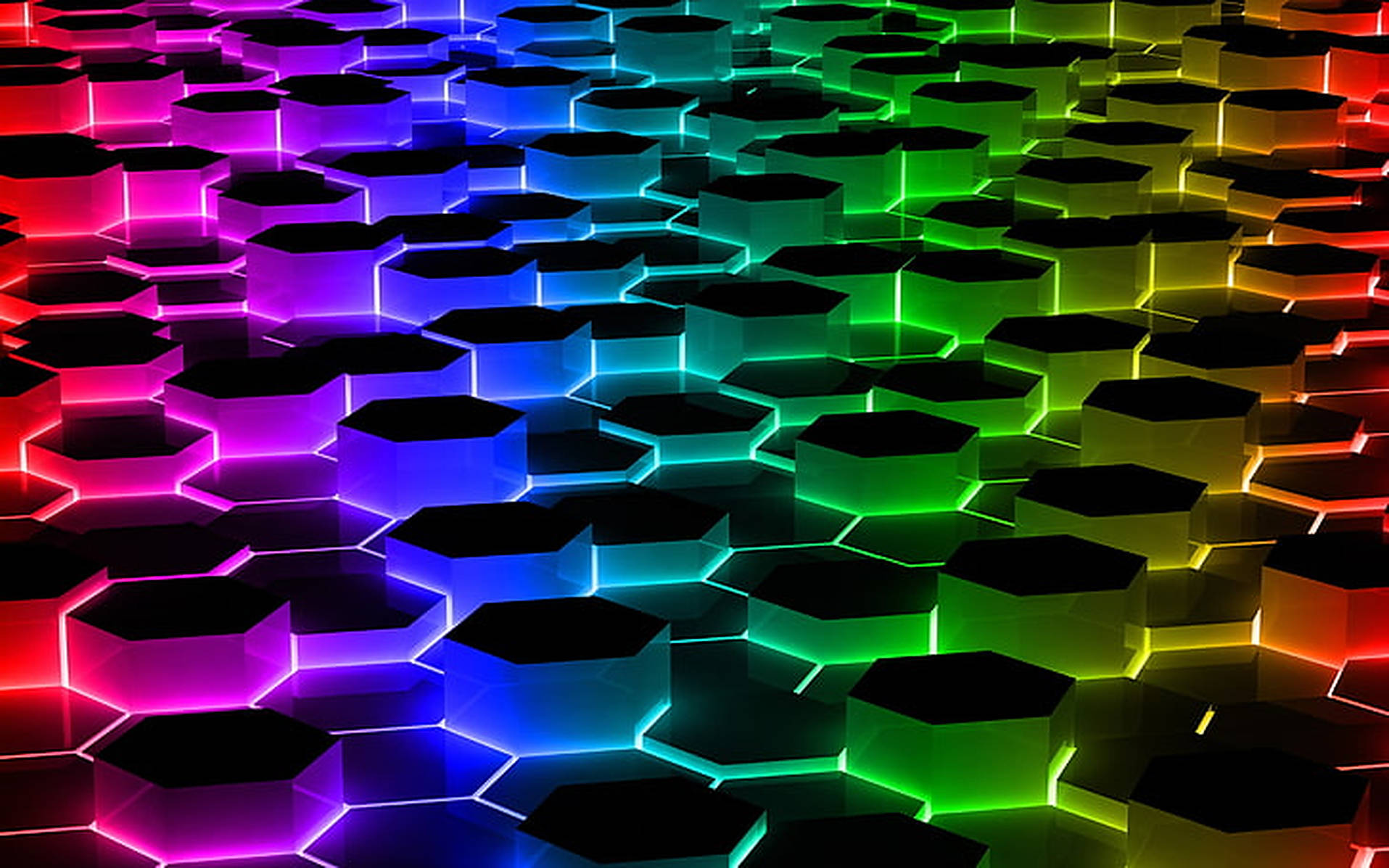 LED 桌布 壁紙 — 一個充滿活力的數位圖案，發光的六邊形在黑暗背景上透過彩虹光譜過渡。