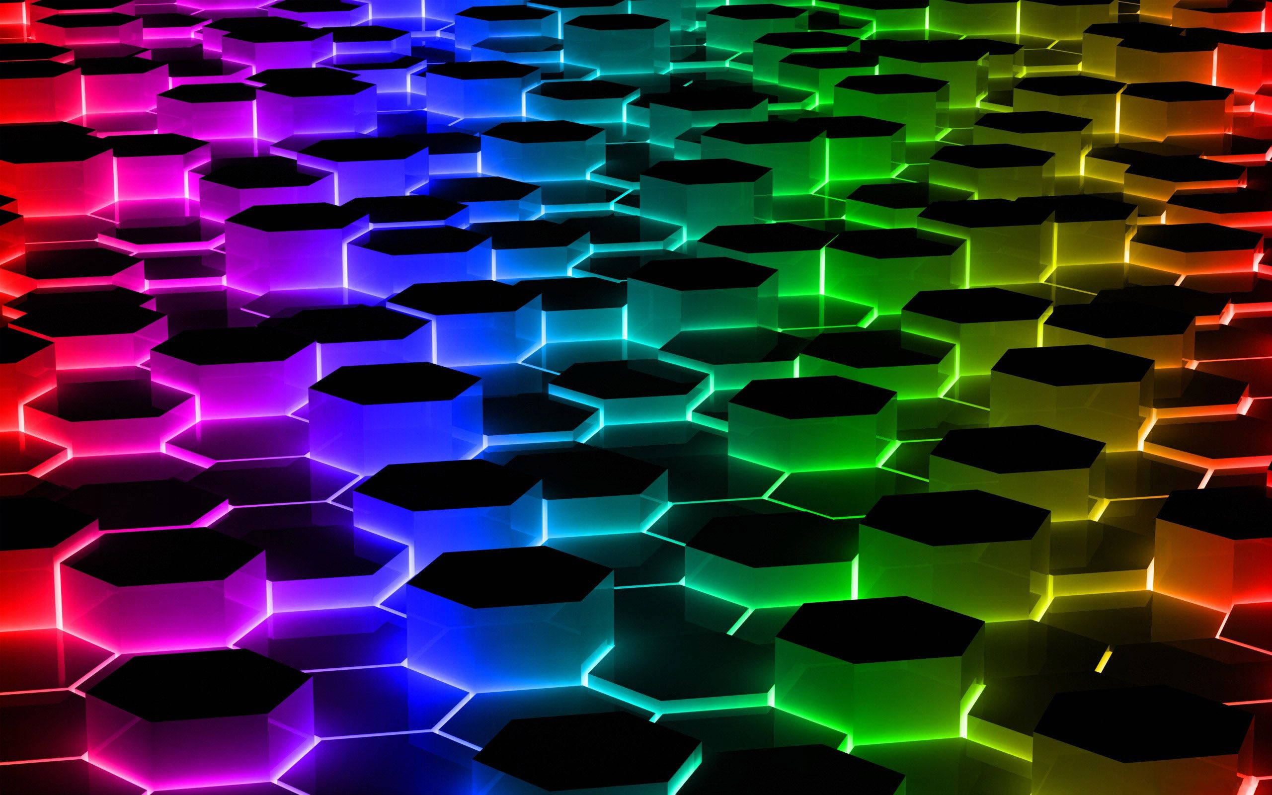 Cool Colorful 桌布 壁紙 — 一個充滿活力的數位景觀，由發光的六邊形在黑暗背景上過渡彩虹漸變組成。
