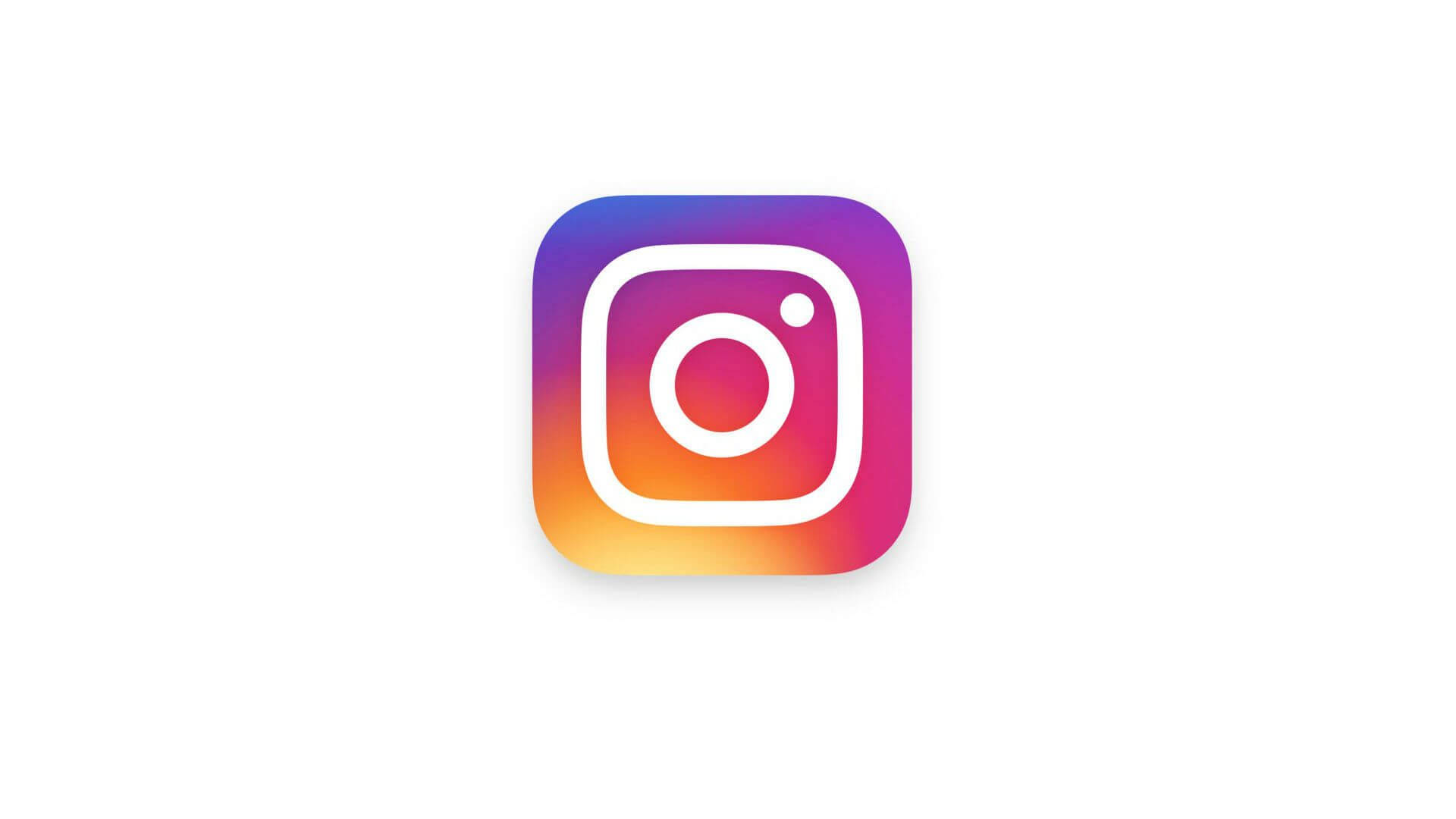 Instagram 桌布 壁紙 — 一個充滿活力的漸變Instagram標誌圖標，居中於乾淨的白色背景上，帶有柔和陰影。