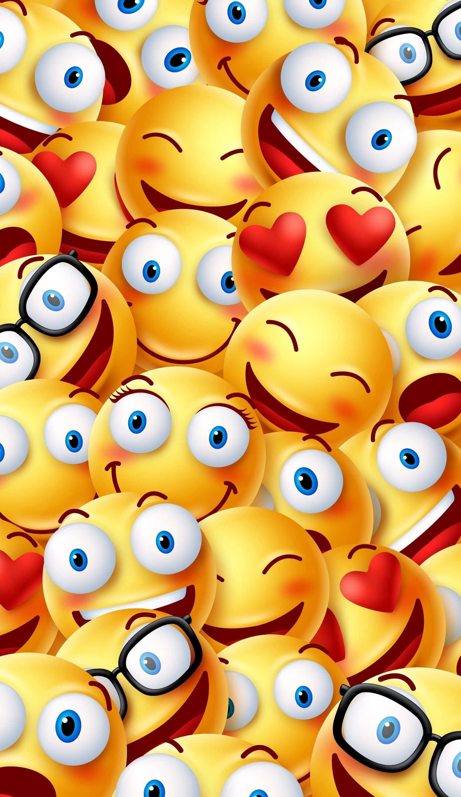 Cute Emoji 桌布 壁紙 — 一個充滿活力的特寫，微笑的黃色表情符號面孔，藍色眼睛和心形眼睛表情。