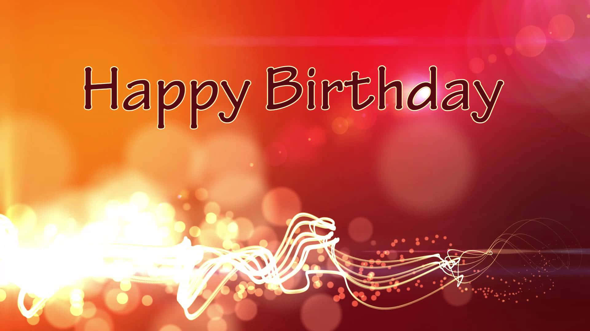漸層 桌布 壁紙 — 一個充滿活力的生日祝福，帶有發光的光跡和散景效果，背景是溫暖的漸變色。