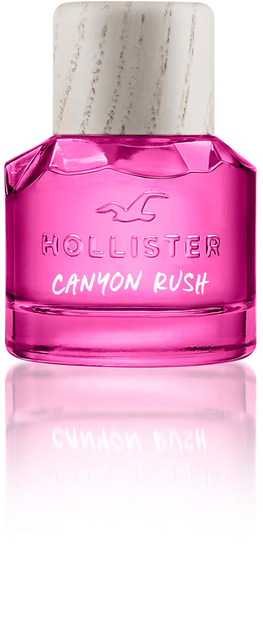 Hollister 桌布 壁紙 — 一個充滿活力的粉紅色Hollister Canyon Rush香水瓶，帶有紋理的白色瓶蓋，放置在反光的白色表面上。