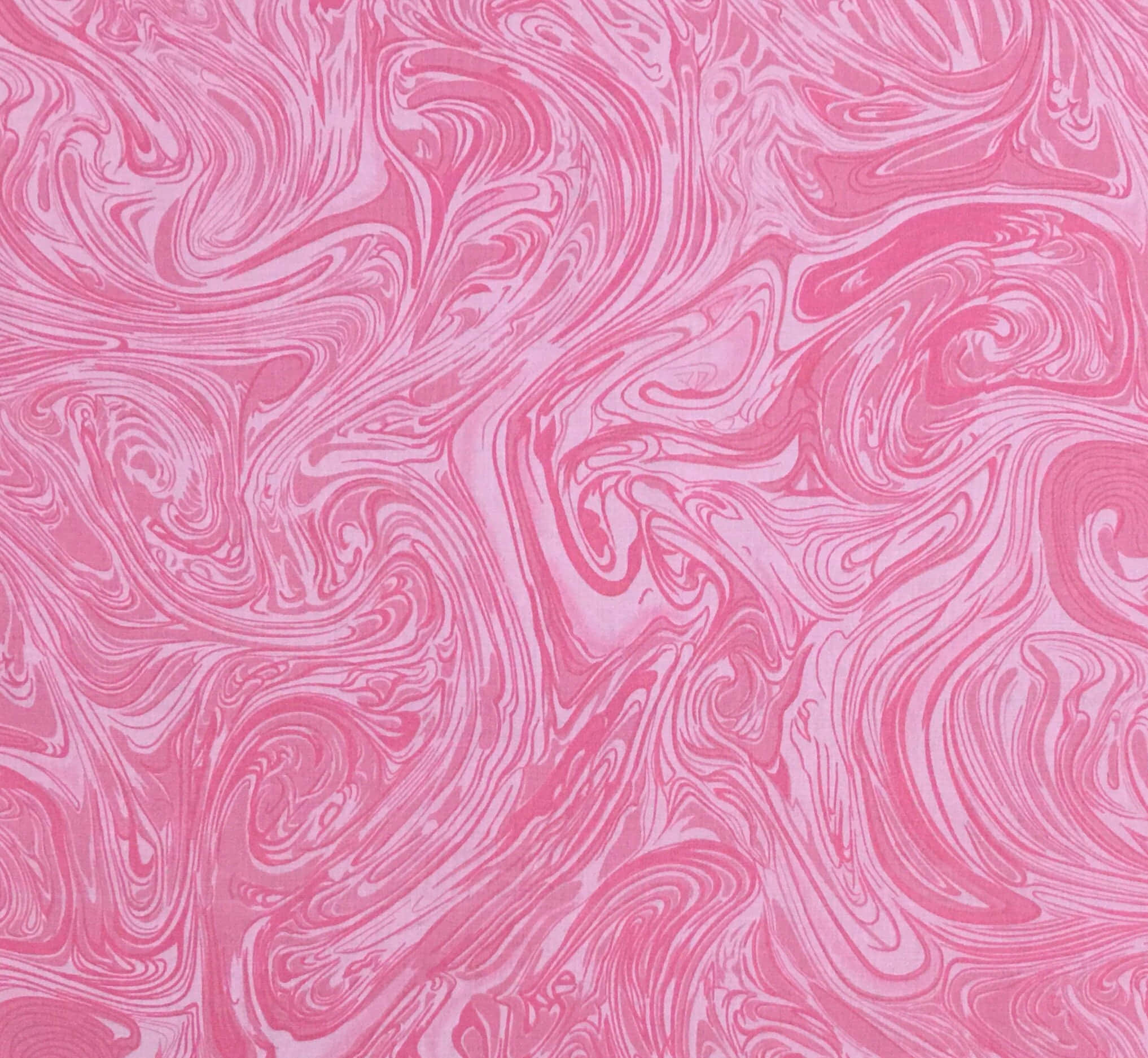 Pink Swirl 桌布 壁紙 — 一個充滿活力的粉紅色和淡粉紅色大理石紋理在整個畫面中流動的漩渦抽象圖案。