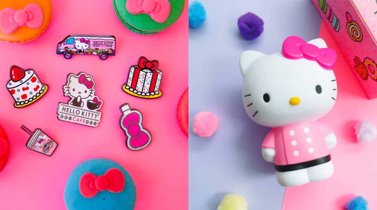 Hello Kitty 桌布 壁紙 — 一個充滿活力的粉紅色表面上展示了Hello Kitty主題的別針和一個毛絨玩具，周圍環繞著色彩繽紛的絨球。
