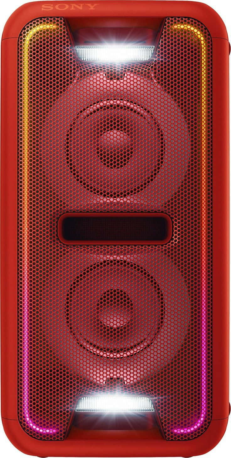 Speaker 桌布 壁紙 — 一個充滿活力的紅色Sony便攜式揚聲器，帶有發光LED燈和穿孔格柵，展示雙驅動器。