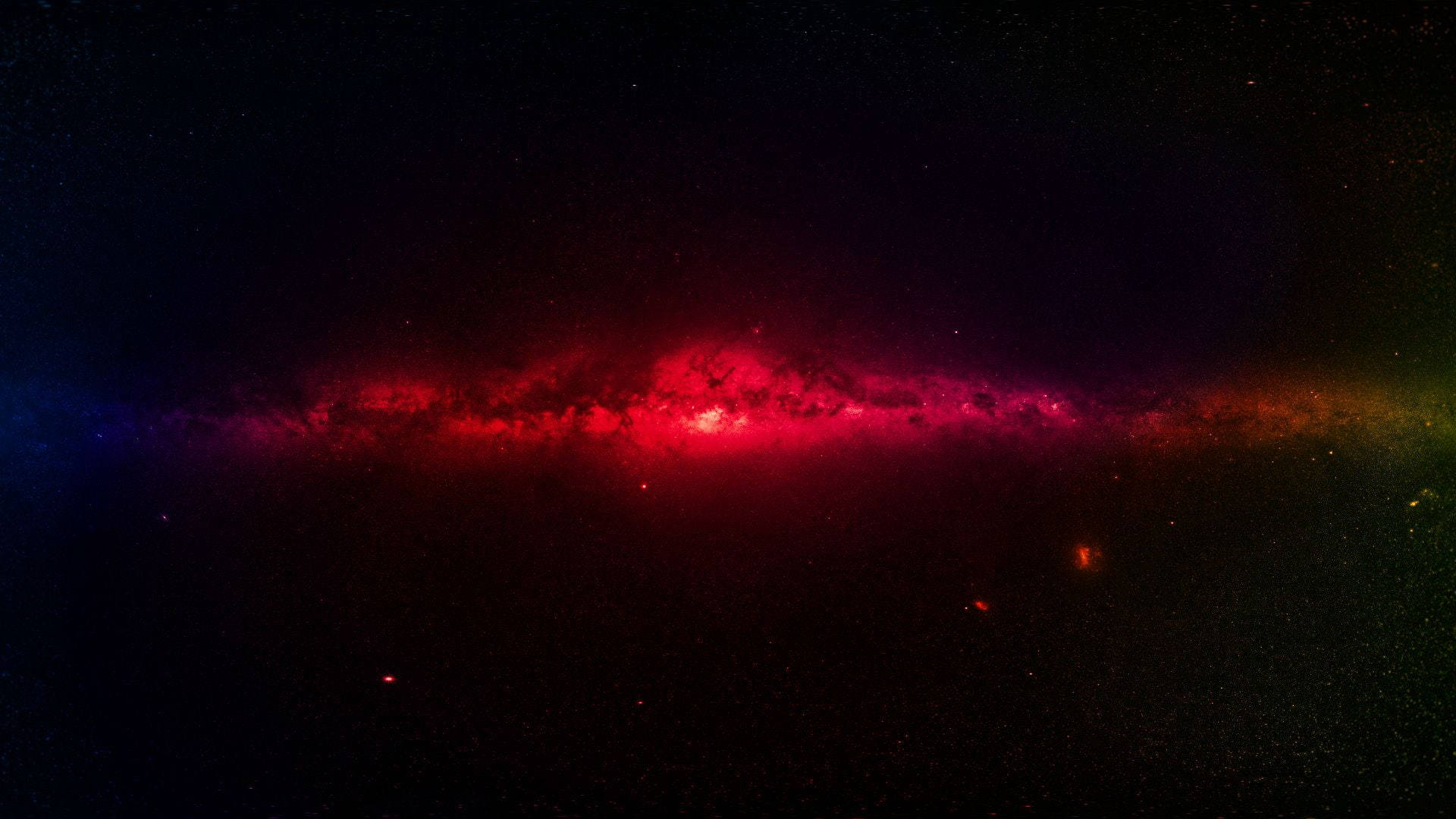 Rainbow Galaxy 桌布 壁紙 — 一個充滿活力的紅色和紫色星系，橫跨佈滿星星的宇宙虛空，帶有發光的星雲和散落的星星。
