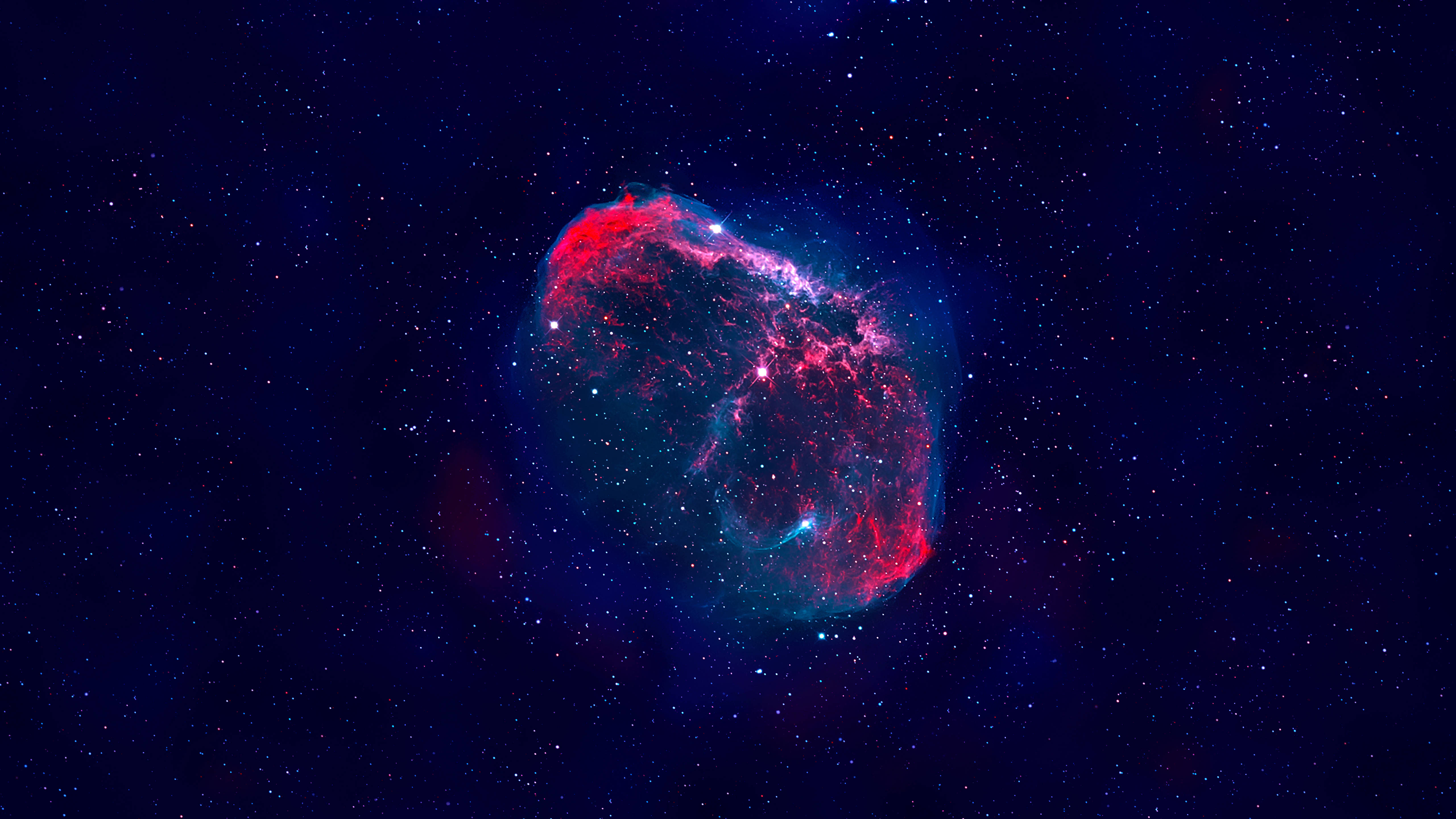 迷幻動圖 桌布 壁紙 — 一個充滿活力的紅色和藍色星雲在深空星場中發光，帶有旋轉的宇宙塵埃和明亮的恆星核心。