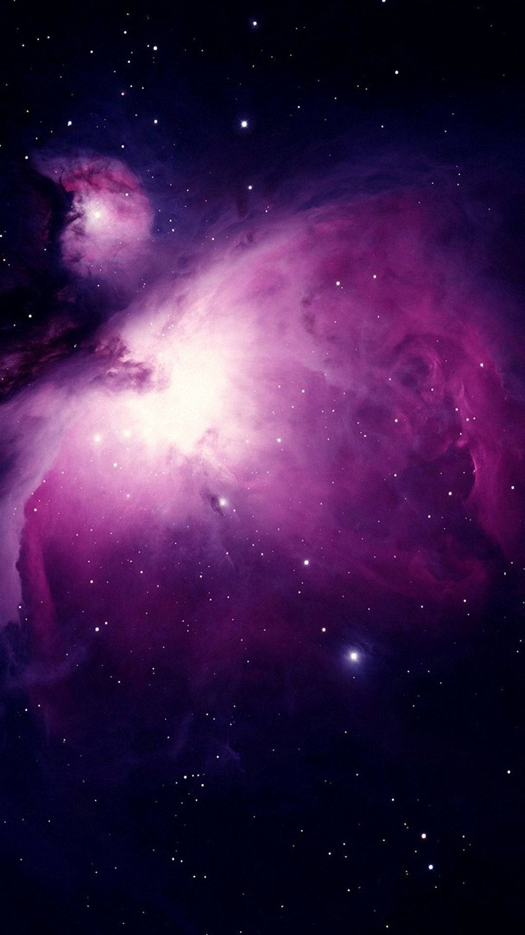 Cell 桌布 壁紙 — 一個充滿活力的紫色和粉紅色星雲，在深邃的宇宙黑色天空中閃爍著明亮的星星。