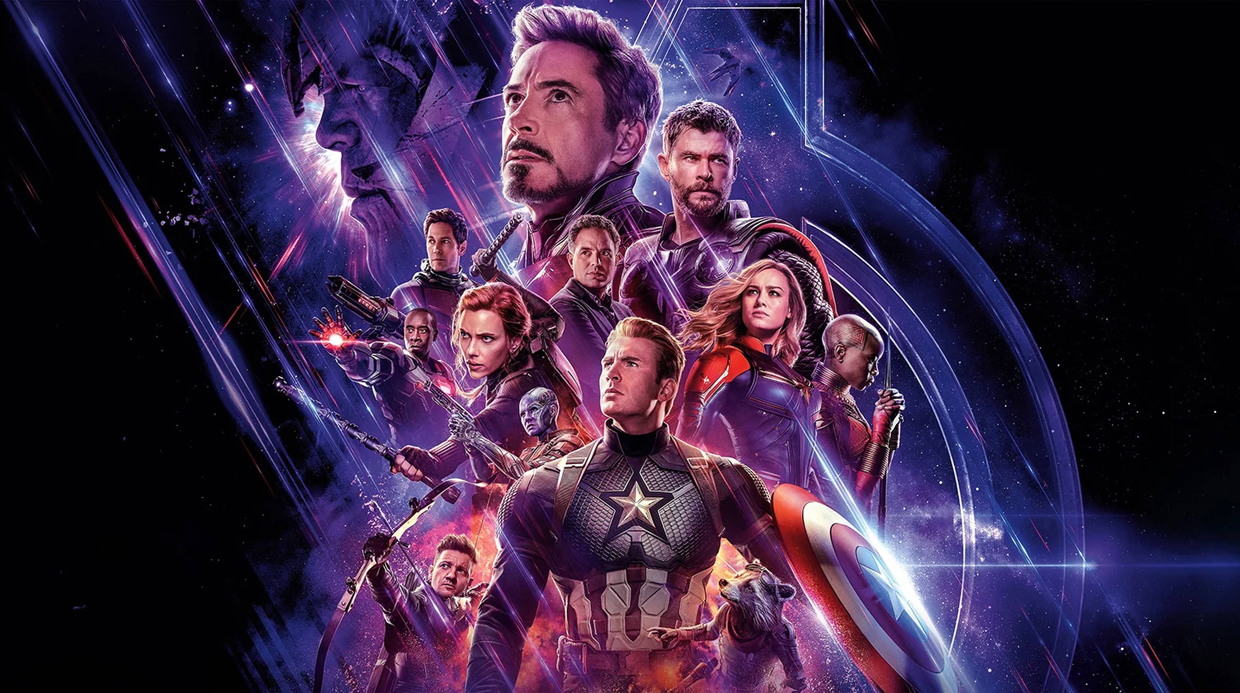 4K Marvel 壁紙 桌布 壁紙 — 一個充滿活力的超級英雄團隊，在星空和發光能量軌跡的宇宙背景下英勇站立。