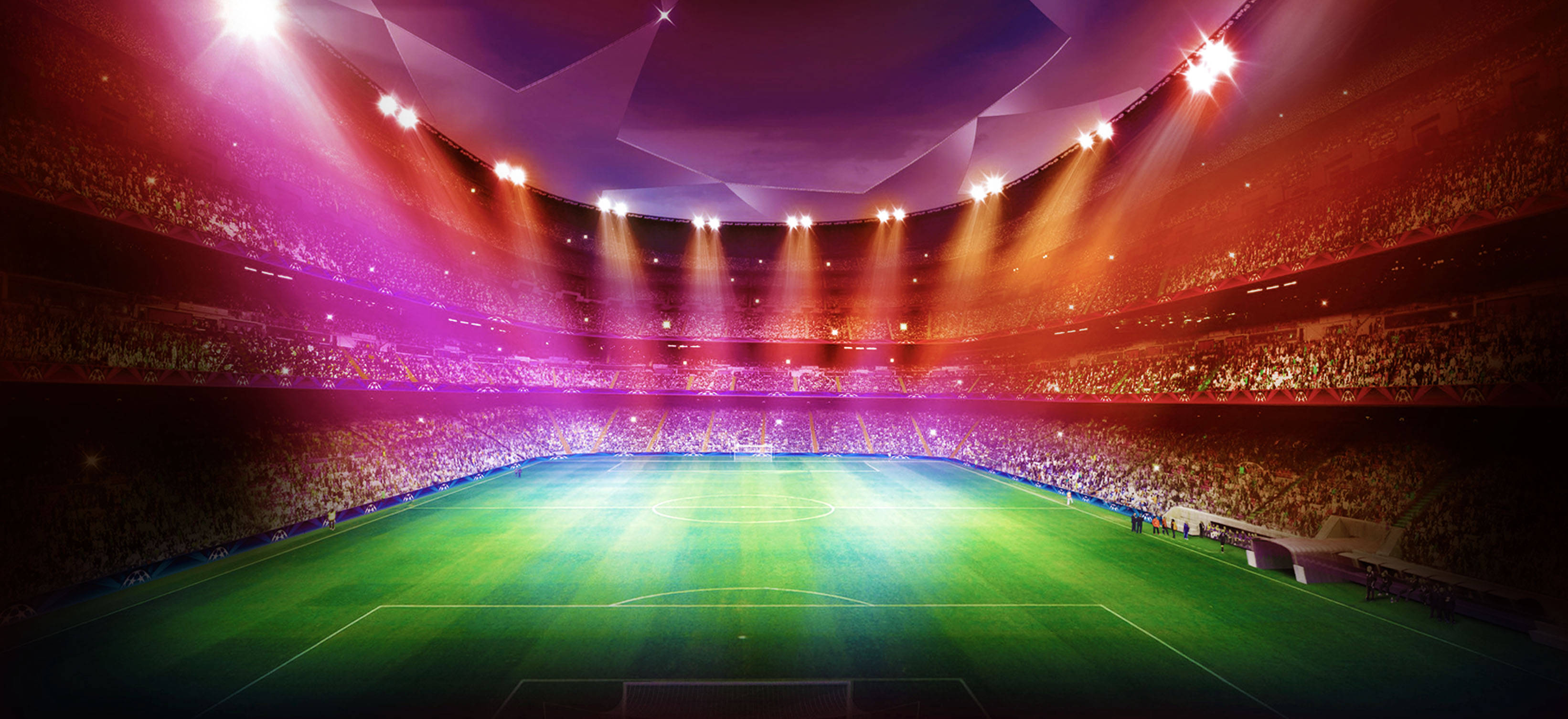 Stadium 桌布 壁紙 — 一個充滿活力的足球場，沐浴在紫色和橙色的燈光中，擠滿了人群在戲劇性的聚光燈下歡呼。
