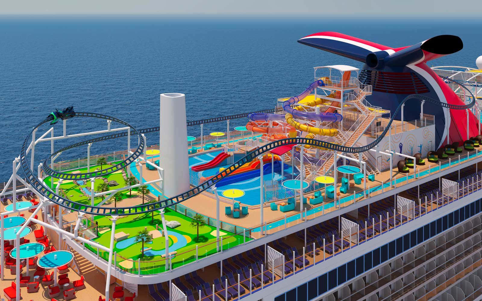 Carnival Conquest 桌布 壁紙 — 一個充滿活力的郵輪甲板，設有雲霄飛車式水上滑梯和熱帶泳池，背景是廣闊的藍色海洋。