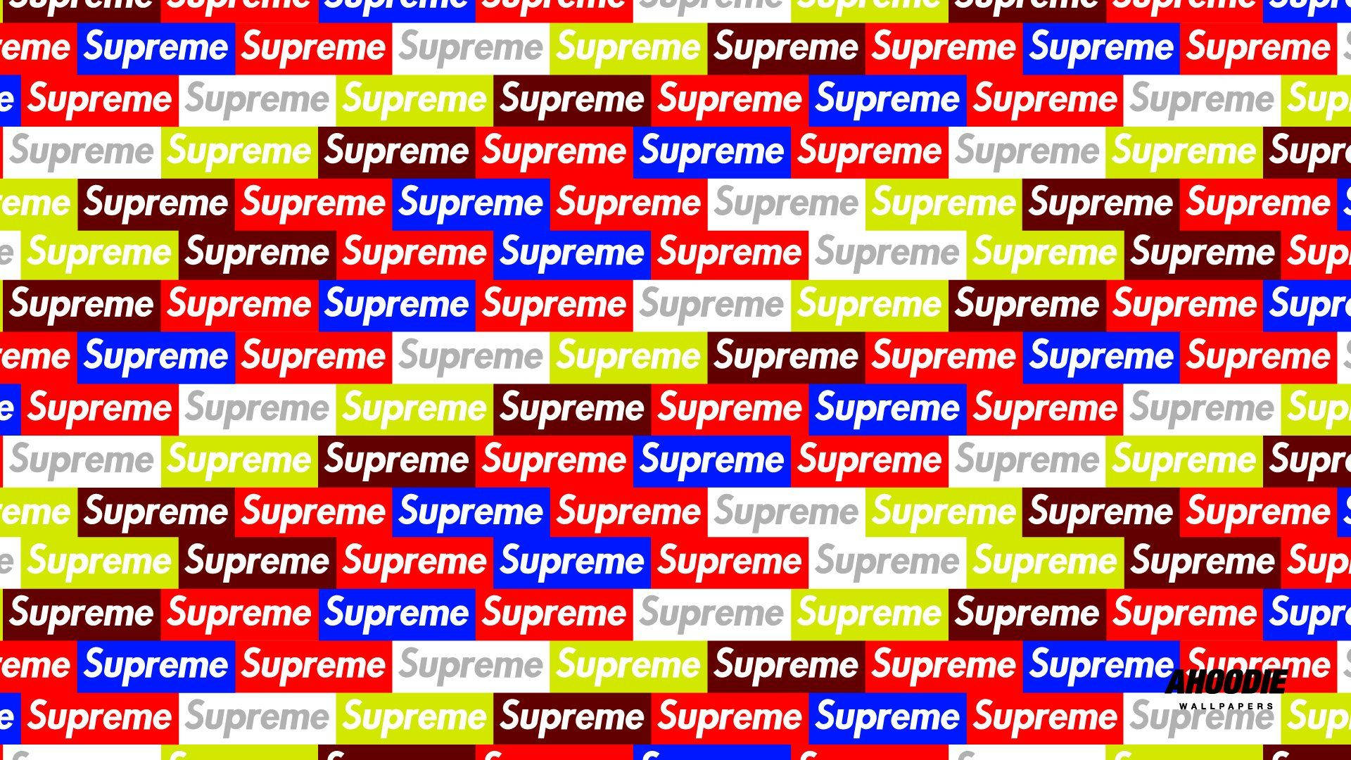 supreme 桌布 壁紙 — 一個充滿活力的重複圖案，由大膽的紅色、藍色、綠色和白色區塊中的「Supreme」標誌組成。