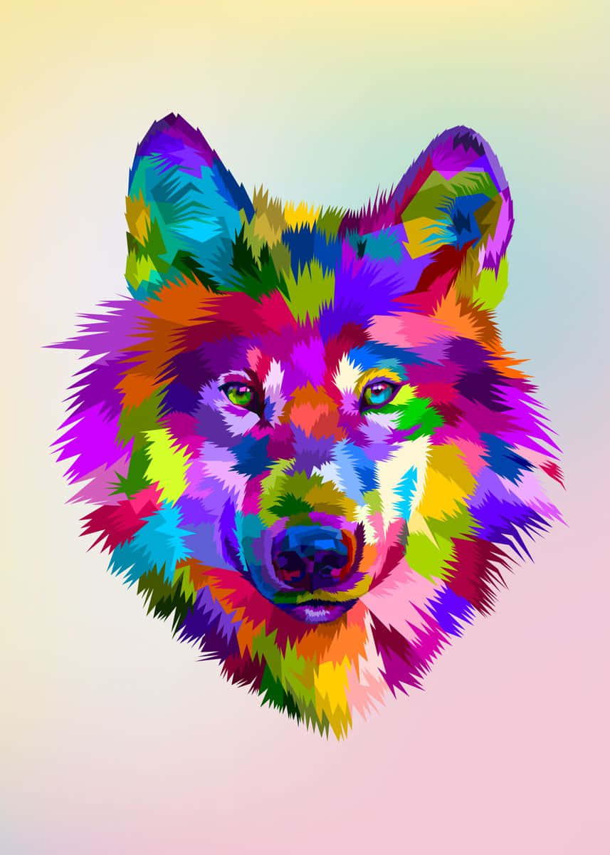 Rainbow Wolf 桌布 壁紙 — 一個充滿活力的風格化狼頭，帶有多色幾何毛皮，襯托著柔和的漸變背景。