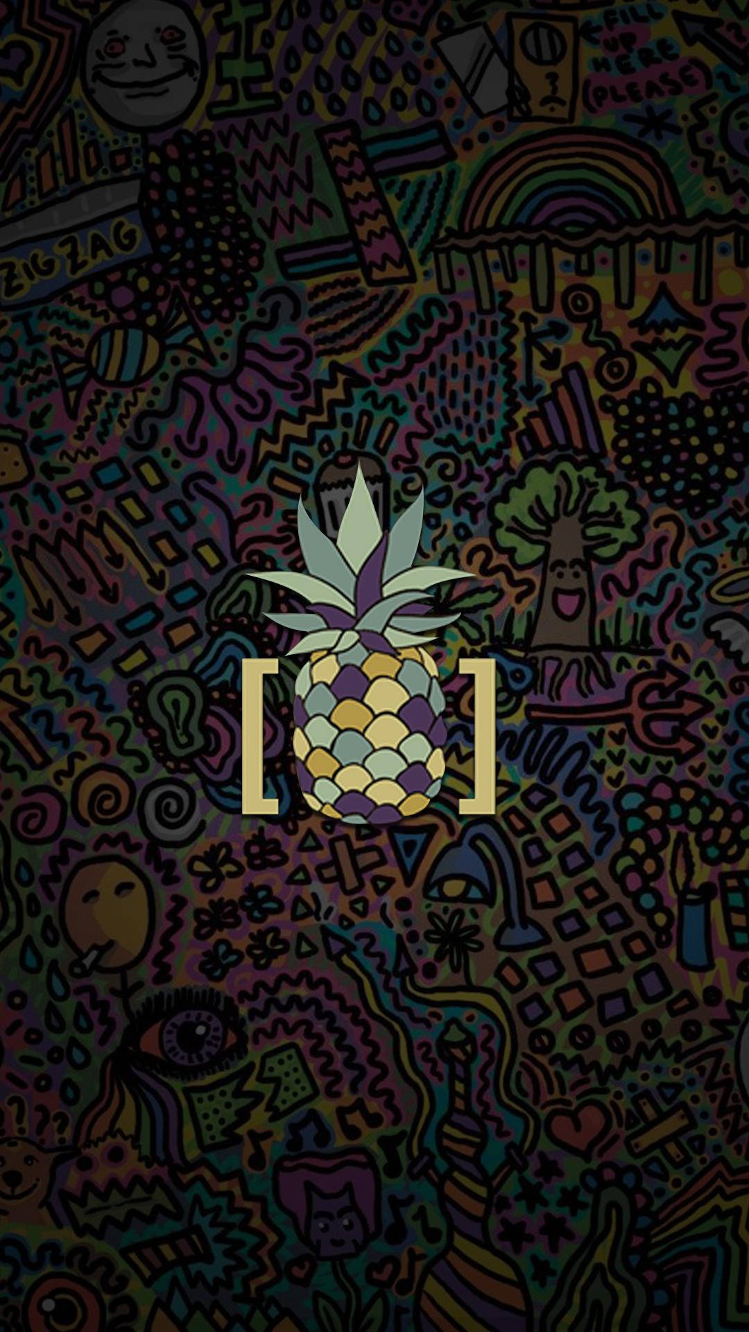 Pineapple 桌布 壁紙 — 一個充滿活力的鳳梨，位於混亂多彩的塗鴉背景中央，帶有抽象圖案和奇思妙想的臉孔。