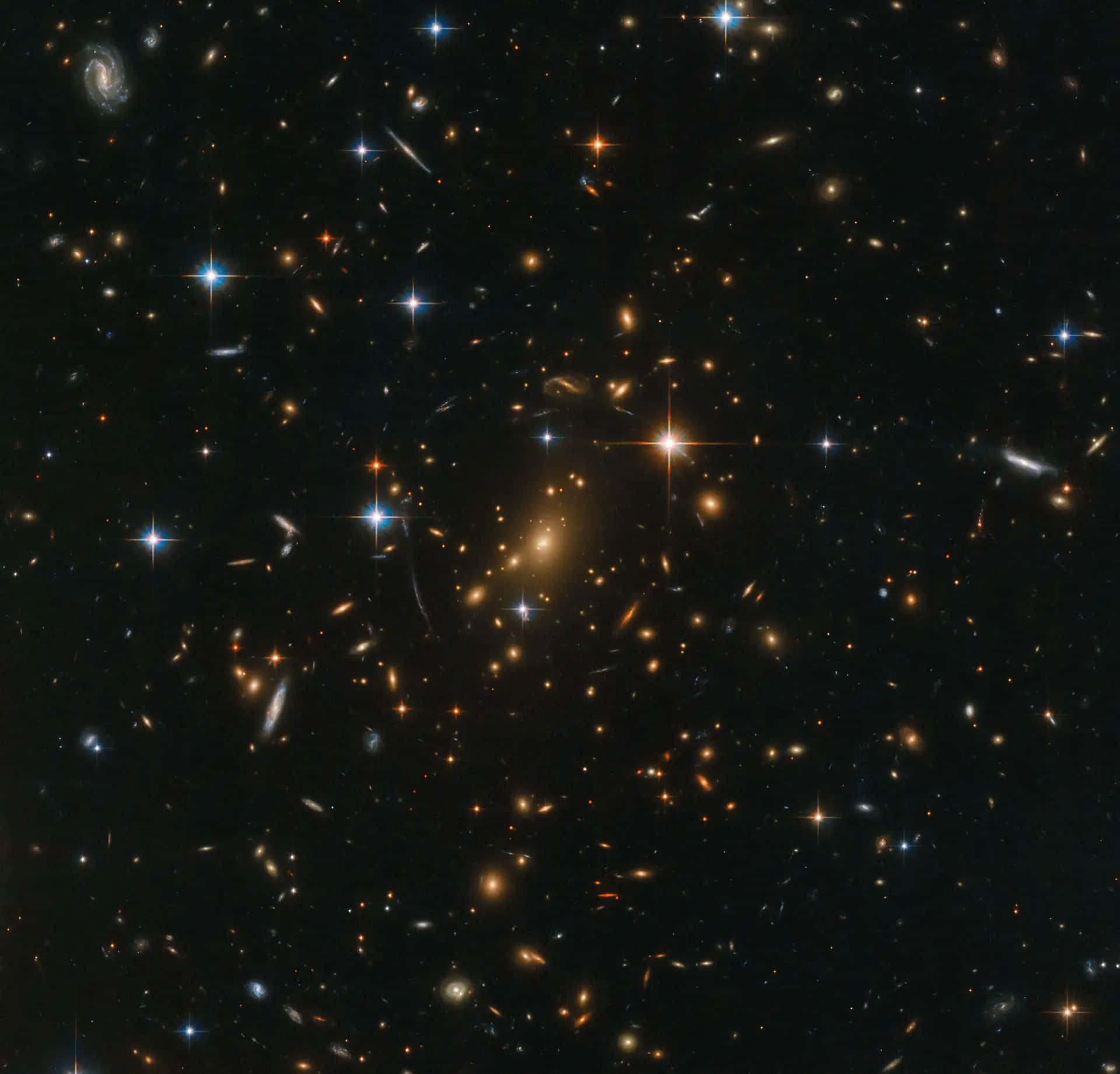 太空 桌布 壁紙 — 一個充滿無數恆星和遙遠星系的宇宙景觀，在深邃的黑色太空虛空中閃耀。