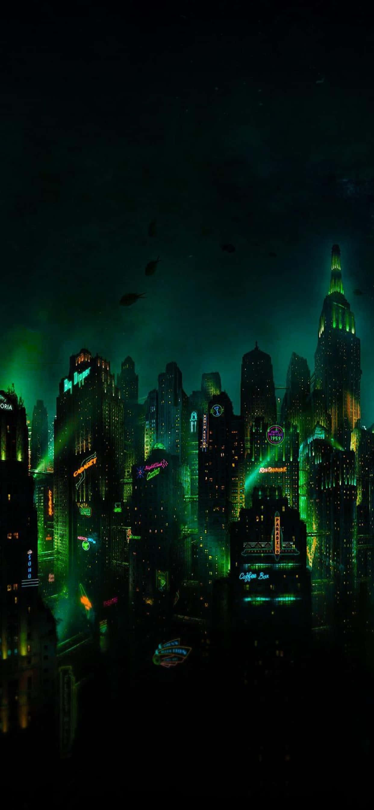 underworld 桌布 壁紙 — 一個充滿霓虹燈的未來主義城市夜景，高聳的摩天大樓在黑暗的天空下閃耀著鮮豔的綠色和紫色色調。