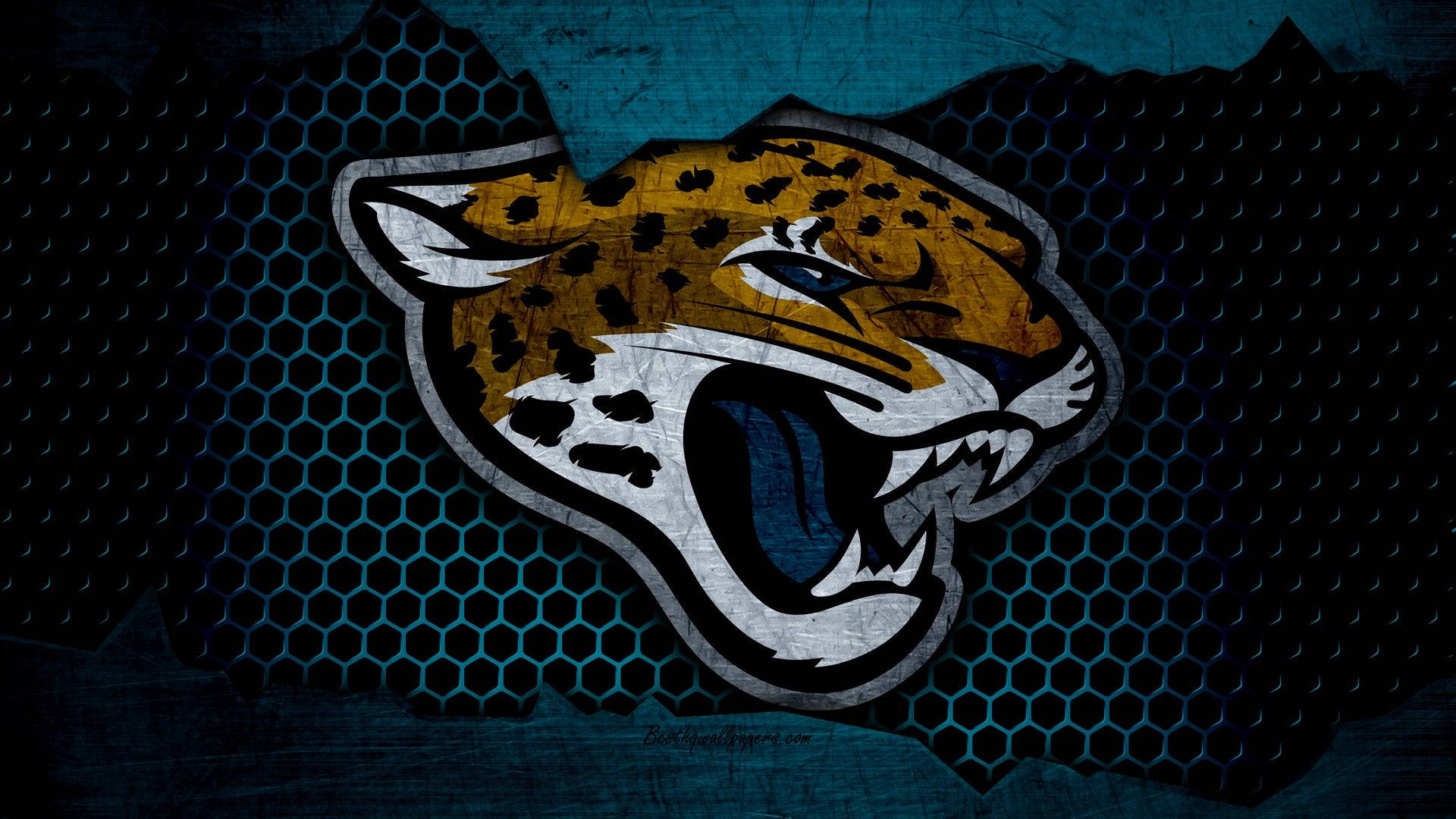 Jaguars 桌布 壁紙 — 一個兇猛咆哮的美洲豹標誌，帶有黃色和黑色斑點，置於深藍色六角網格背景上。