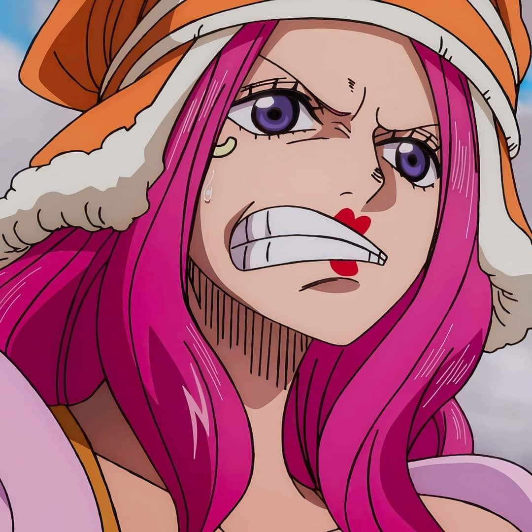 Jewelry Bonney 桌布 壁紙 — 一個兇猛的動漫女孩，粉紅色頭髮和紫色眼睛，咬緊牙關生氣，戴著橙色帽子。