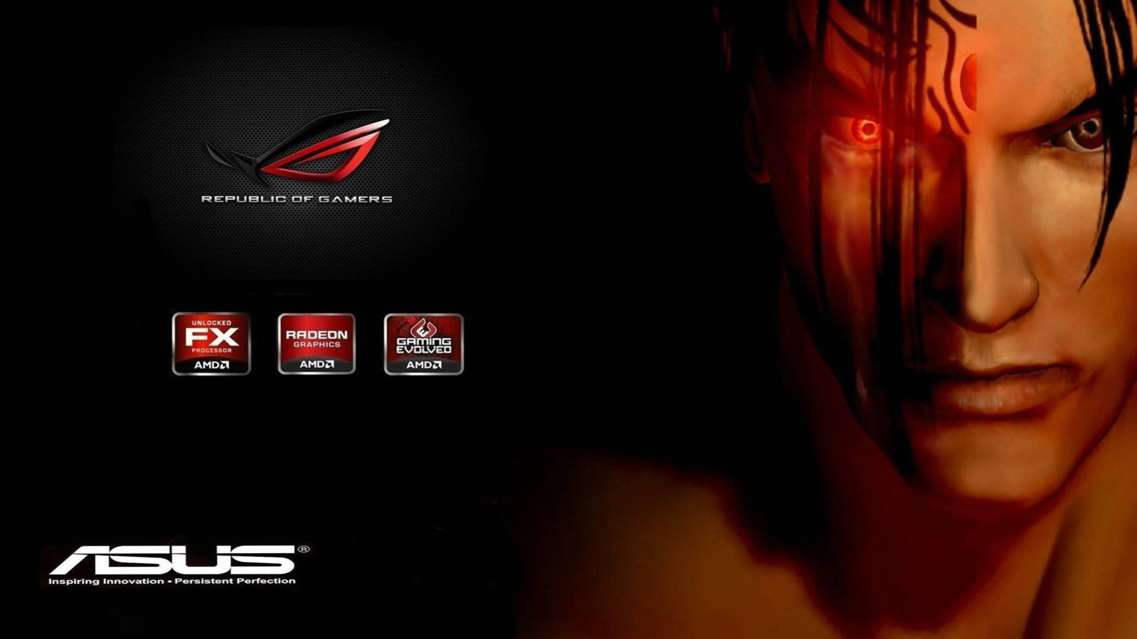 Jin Kazama 桌布 壁紙 — 一個兇猛的動漫戰士，擁有發光的紅色眼睛，在帶有ASUS ROG標誌和AMD圖形徽章的黑暗背景下凝視。