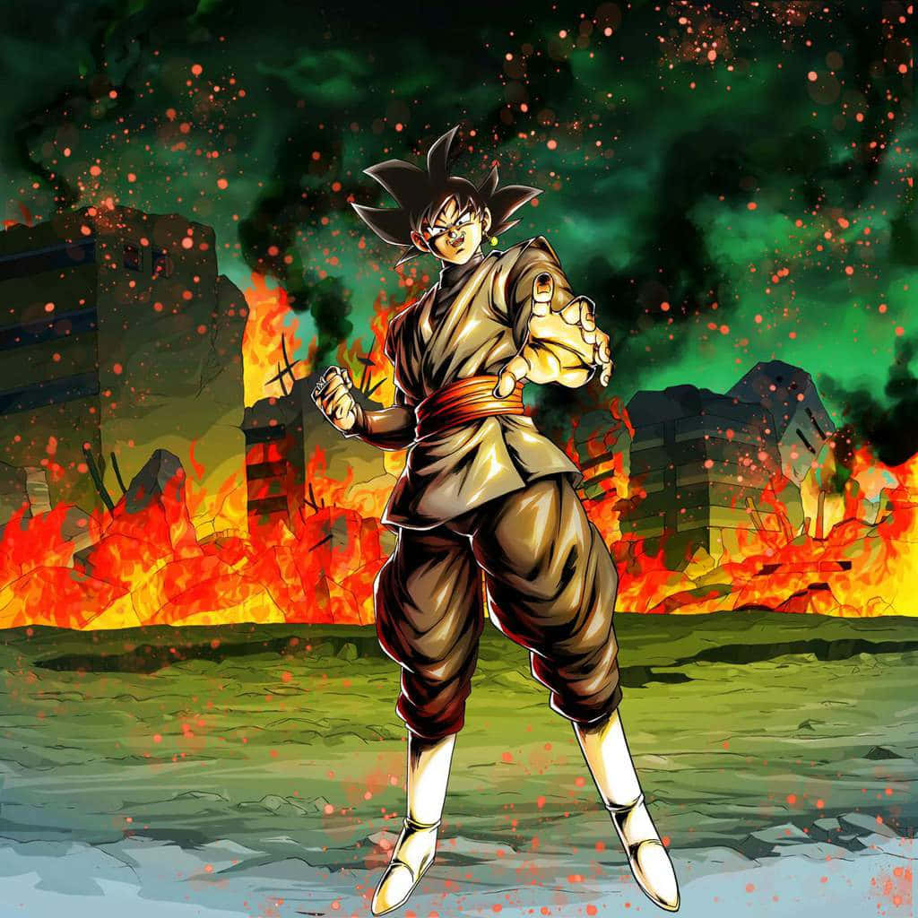 Dragon Ball Characters 桌布 壁紙 — 一個兇猛的動漫戰士在綠色和黑色的天空下，站在燃燒的廢墟中擺出戰鬥姿勢。