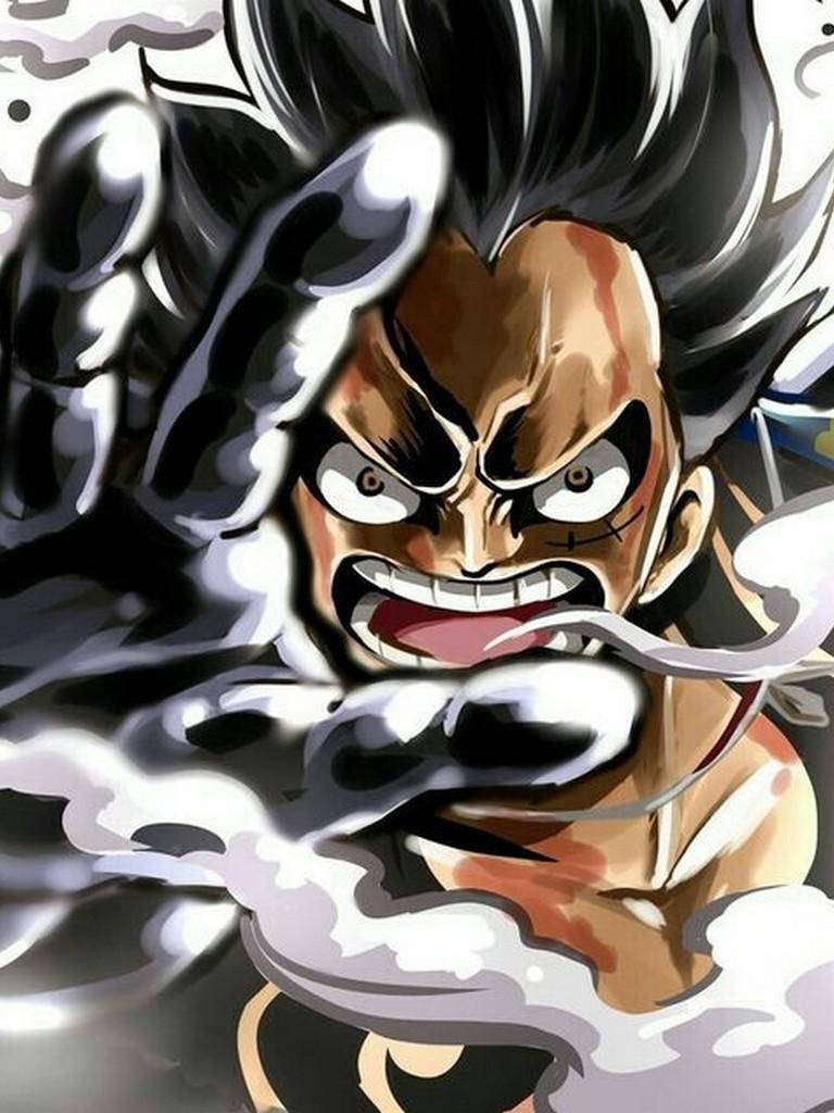 luffy gear 4 桌布 壁紙 — 一個兇猛的動漫角色，有著尖刺頭髮和咆哮的表情，戴著巨大的手套向前猛衝。
