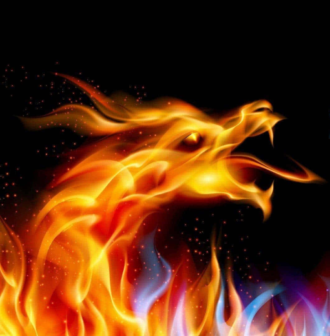 Red Fire 桌布 壁紙 — 一個兇猛的火焰龍頭在黑色背景上咆哮，伴隨著發光的橙色、黃色和藍色火焰以及閃爍的粒子。