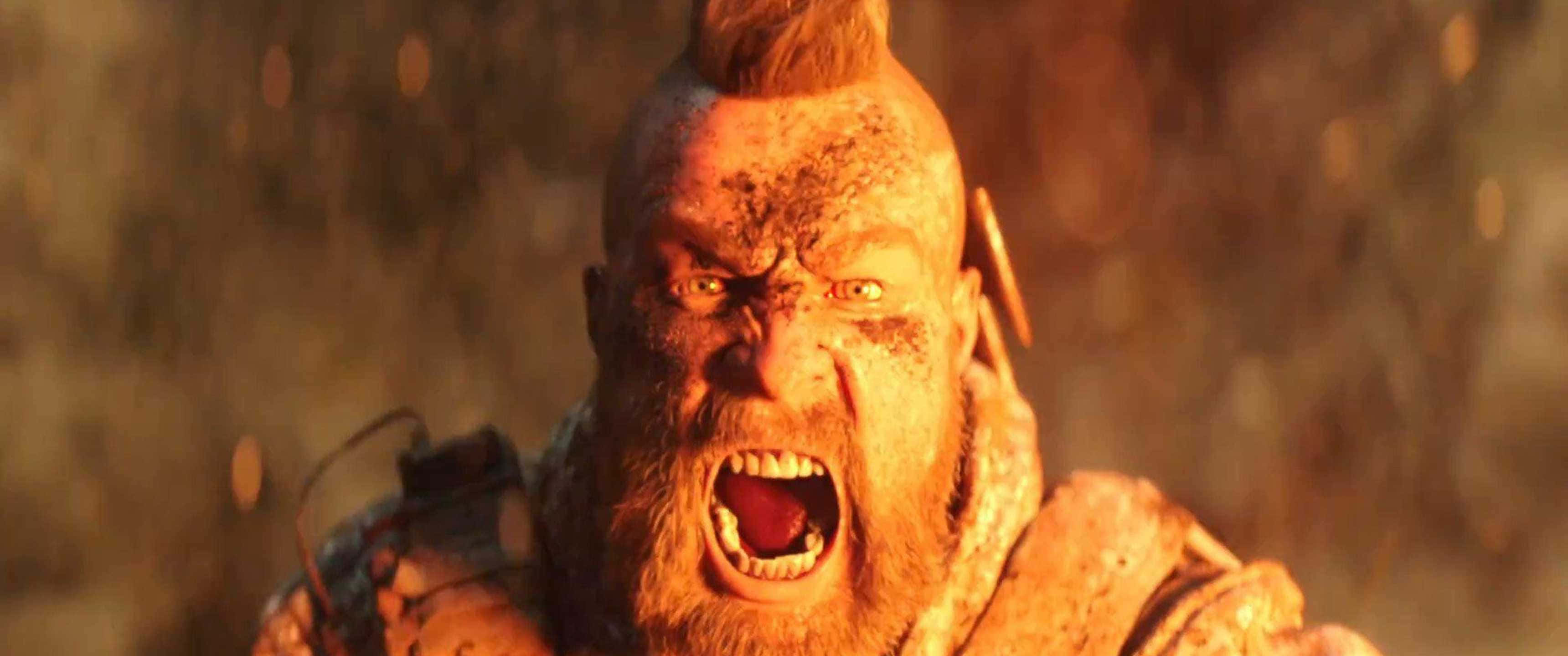 3440x1440p Call Of Duty Black Ops 4 桌布 壁紙 — 一個兇猛的獸人戰士在溫暖的金色光芒下，瞪著發光的眼睛，留著莫霍克頭，發出咆哮。