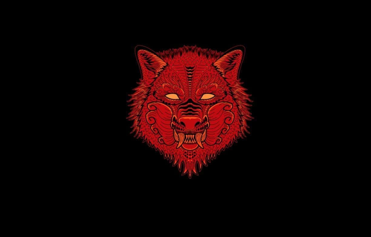 Red Wolf 桌布 壁紙 — 一個兇猛的紅色風格化狼頭，帶有發光的眼睛和複雜的圖案，背景為黑色。