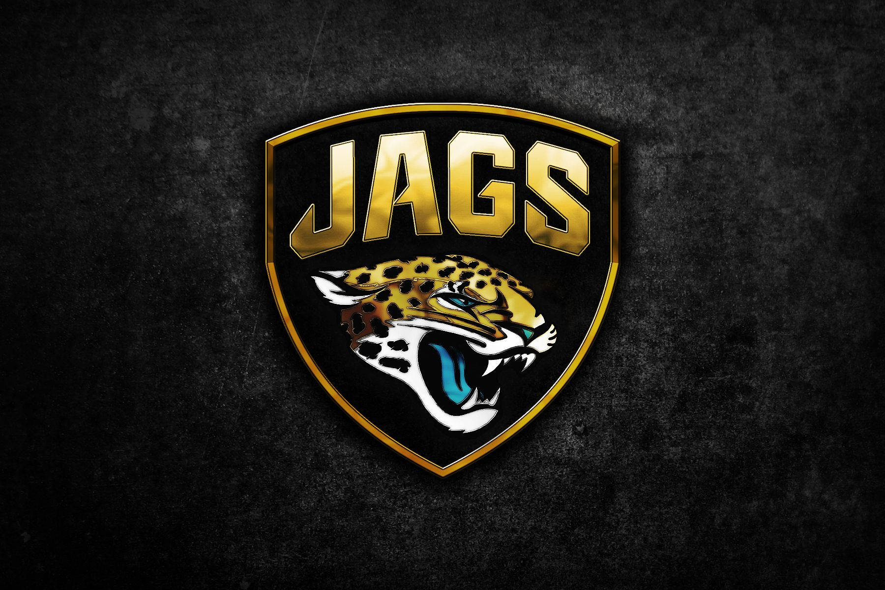 Jaguars 桌布 壁紙 — 一個兇猛的金色美洲豹標誌，帶有 'JAGS' 文字，位於深色紋理背景上。