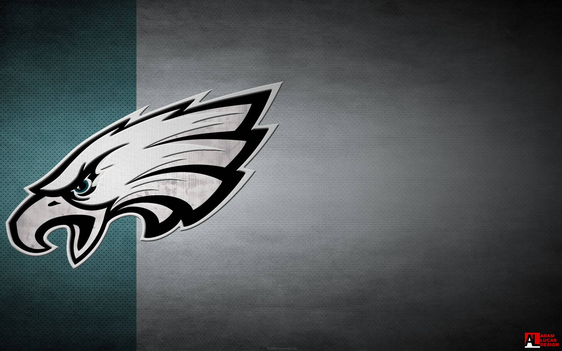 Eagles 桌布 壁紙 — 一個兇猛的鷹標誌，帶有銳利的金屬銀色和黑色細節，置於分區的藍綠色和灰色紋理背景上。