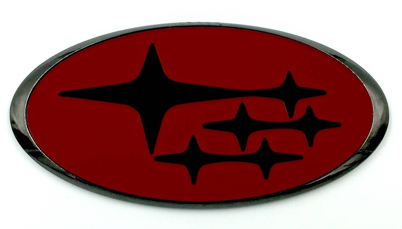 Subaru Logo 桌布 壁紙 — 一個光滑的紅色橢圓形徽章，帶有黑色星爆標誌，置於純白背景上。
