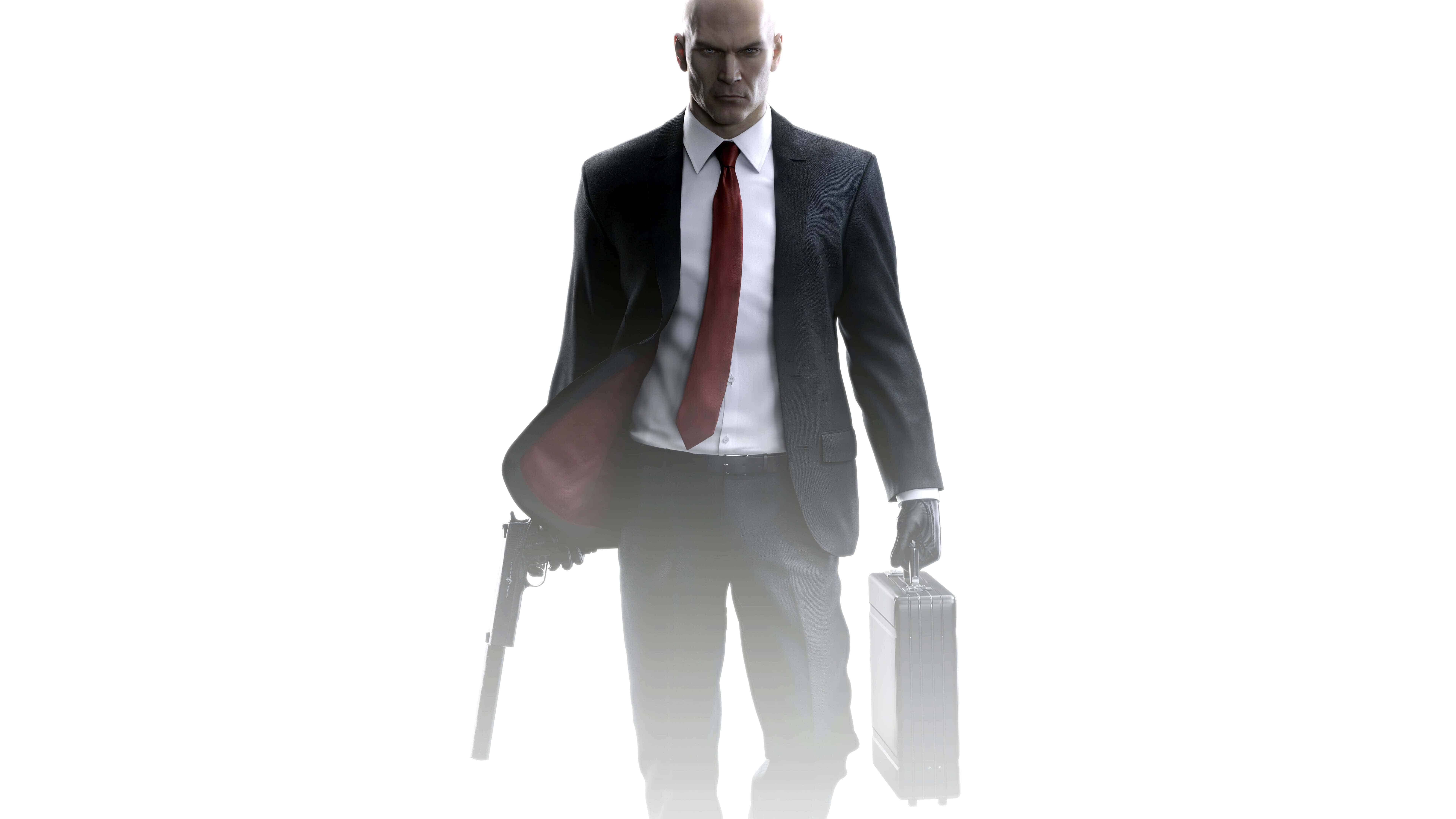 Hitman Phone 桌布 壁紙 — 一個光頭男人穿著深色西裝和紅色領帶，在純白背景前拿著槍和銀色公事包。