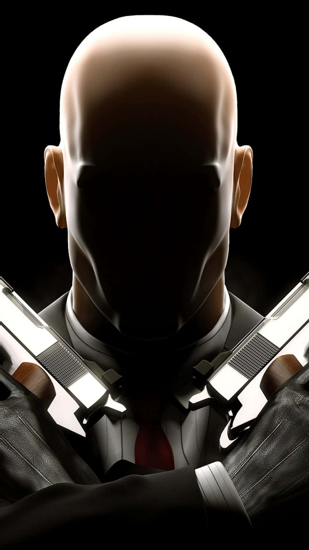 iPhone X Hitman 2 桌布 壁紙 — 一個光頭男人穿著西裝，在黑色背景前將兩把手槍交叉放在胸前。