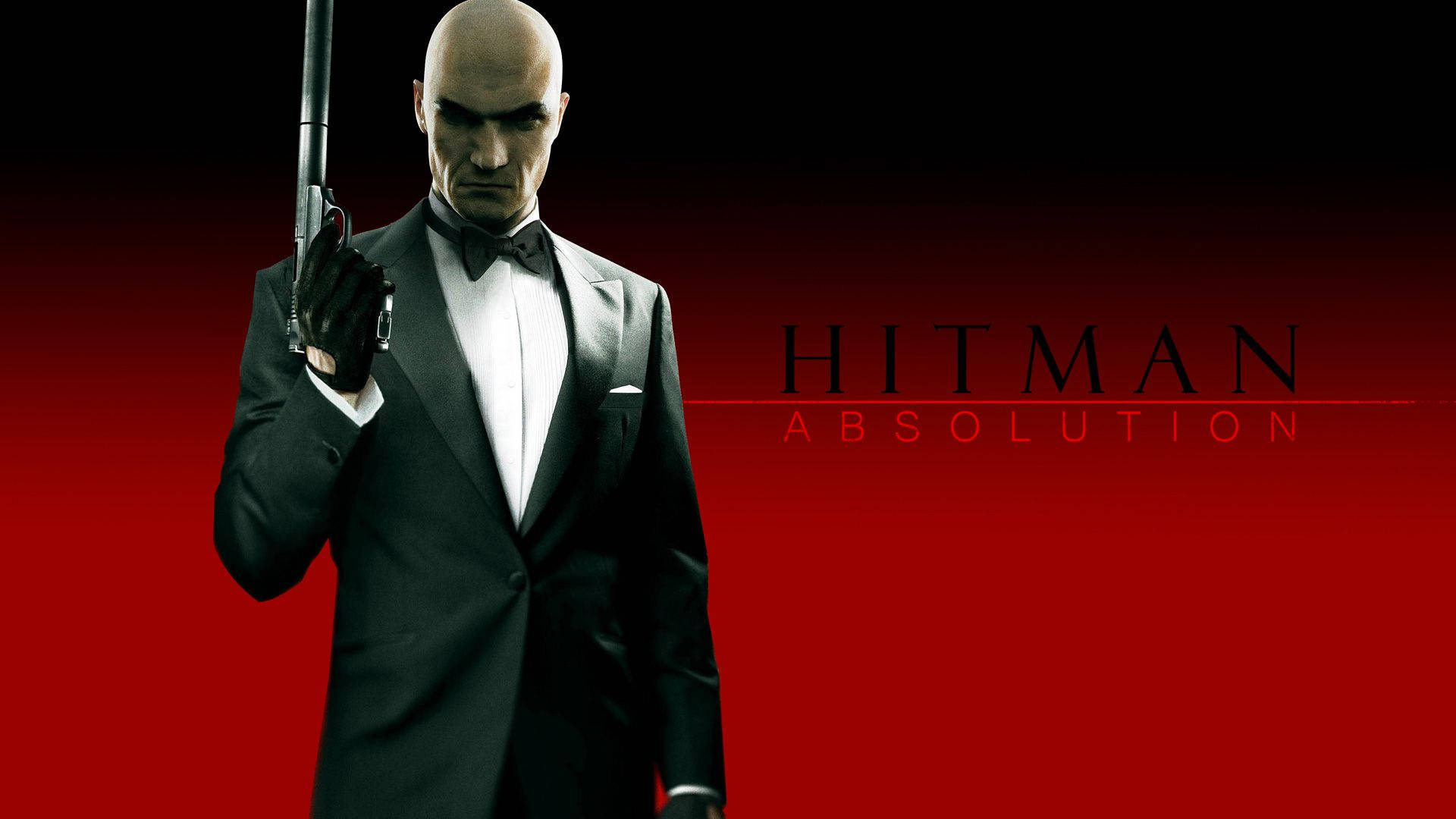 Hitman Absolution 桌布 壁紙 — 一個光頭男子身穿黑色燕尾服，在紅色漸層背景上手持手槍，並帶有 'Hitman Absolution' 文字。