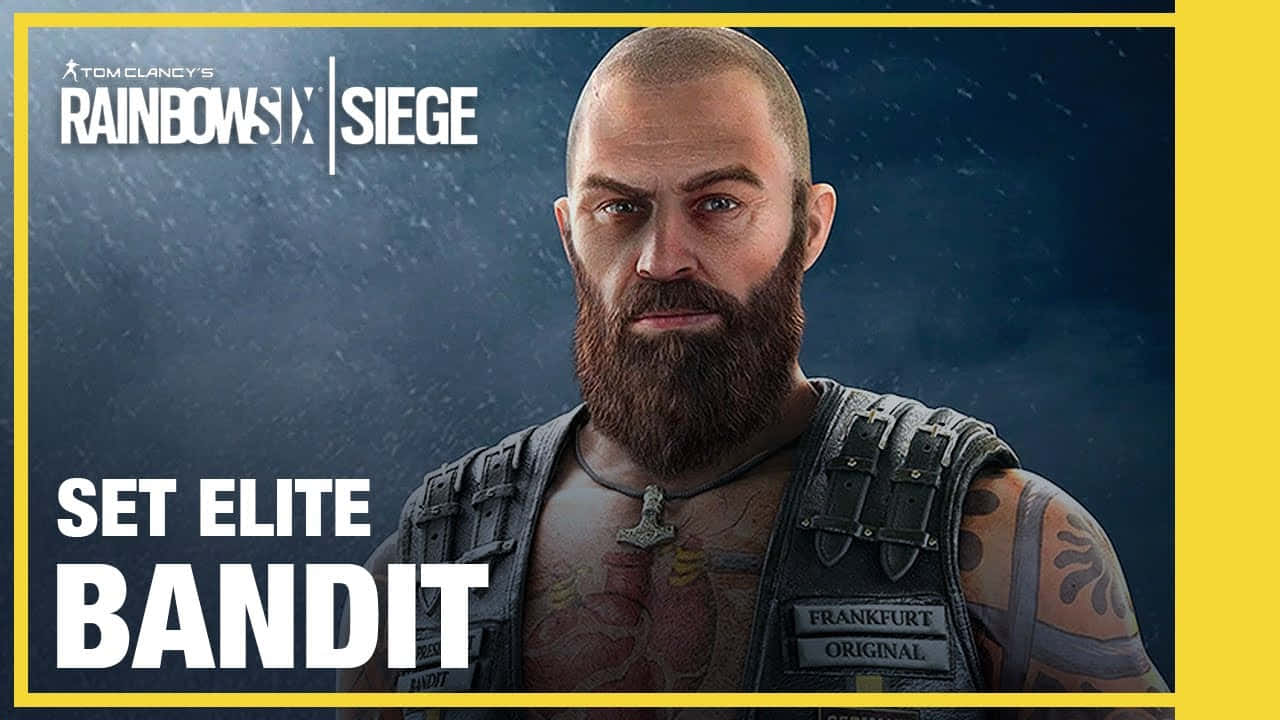 Rainbow Six Siege Bandit 桌布 壁紙 — 一個光頭鬍鬚男，身上有刺青，穿著印有Frankfurt Original字樣的戰術背心，背景是黑暗下雨的環境。