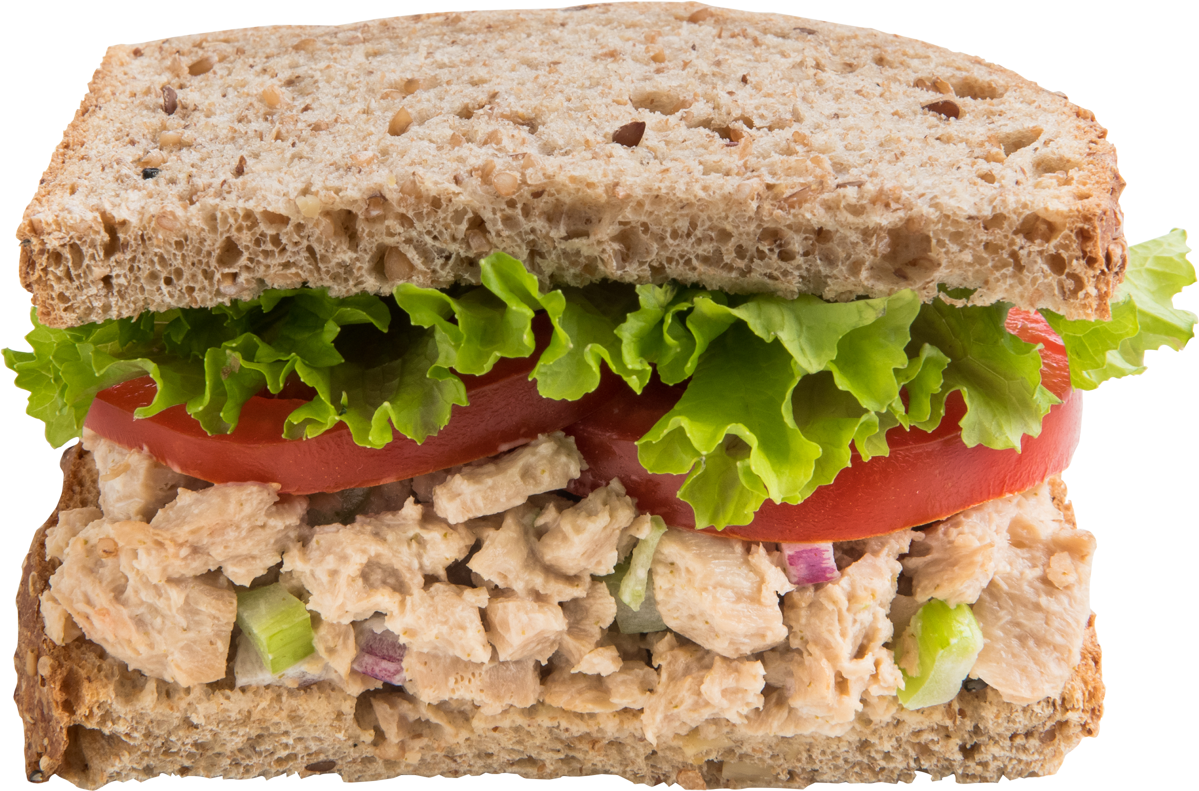 Tuna 桌布 壁紙 — 一個全麥三明治的特寫，餡料是鮪魚沙拉、生菜和番茄，背景是黑色。
