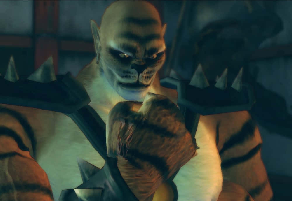 Mortal Kombat Kintaro 桌布 壁紙 — 一個具威脅性、像老虎的人形生物，眼睛發光，身穿尖刺盔甲，在昏暗的地牢中握著血淋淋的拳頭。