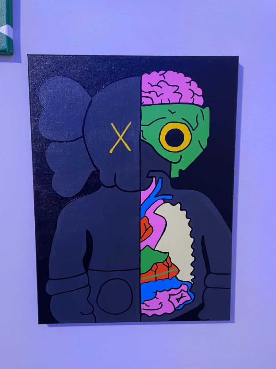 KAWS 桌布 壁紙 — 一個分裂面孔的KAWS公仔，一側黑暗並戴著面具，另一側露出色彩繽紛的內臟和大腦。