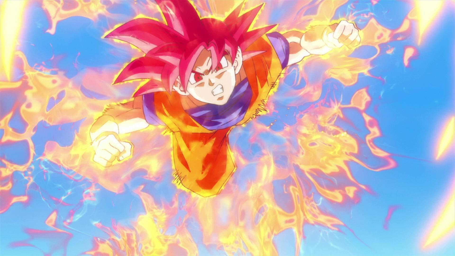 kaioken 桌布 壁紙 — 一個刺蝟頭動漫戰士穿著橙色和藍色盔甲，帶著強烈的決心飛過充滿旋轉金色火焰的天空。
