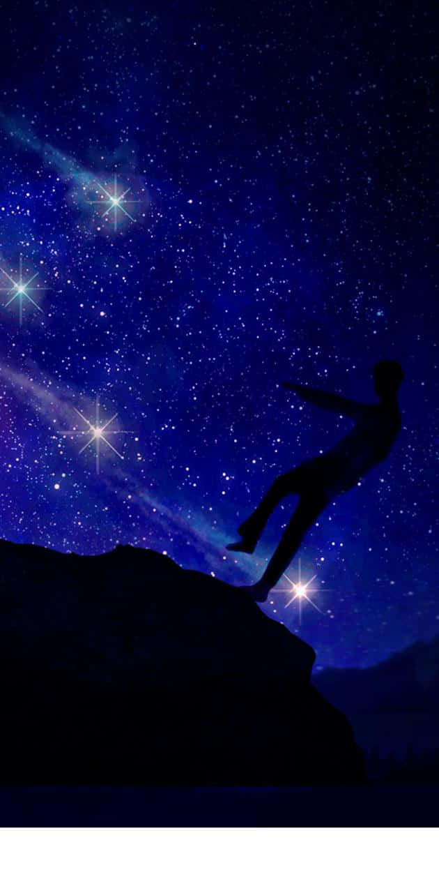 Shooting Star 桌布 壁紙 — 一個剪影人物從懸崖跳入充滿閃爍星星和宇宙射線的 vibrant 星空夜空。