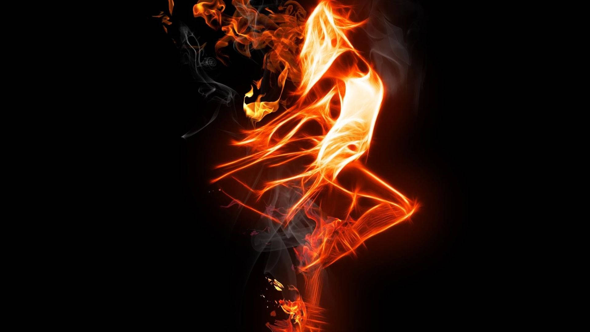 Fire Girl 桌布 壁紙 — 一個動態的人形剪影，由旋轉的橙色和黃色火焰在純黑背景上形成。