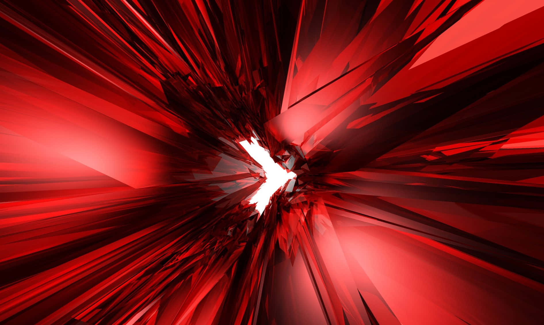 High Resolution Red 桌布 壁紙 — 一個動態的紅色抽象爆炸從明亮的白色核心輻射出尖銳的幾何碎片。