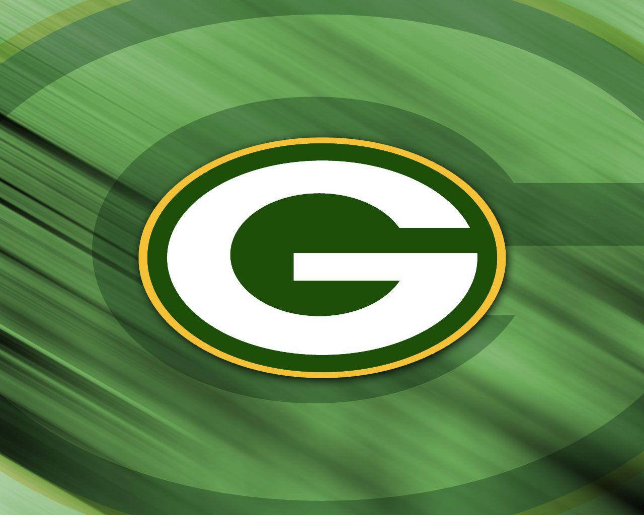 NFL Teams 桌布 壁紙 — 一個動態的綠色和金色綠灣包裝工隊標誌，居中於旋轉的綠色漸變背景上。