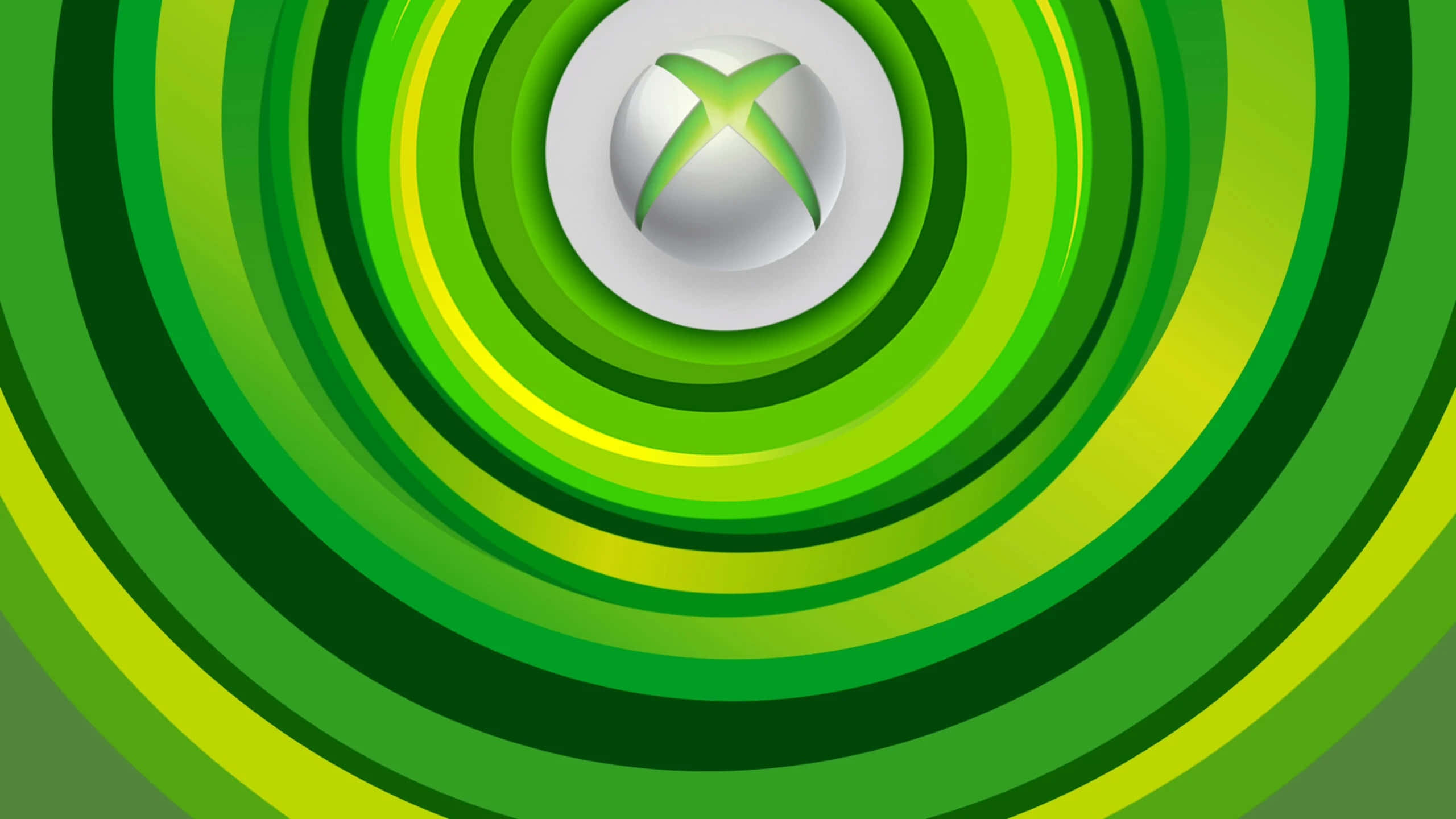 Xbox 桌布 壁紙 — 一個動態的綠色螺旋從中央帶有光澤高光的Xbox標誌向外輻射。