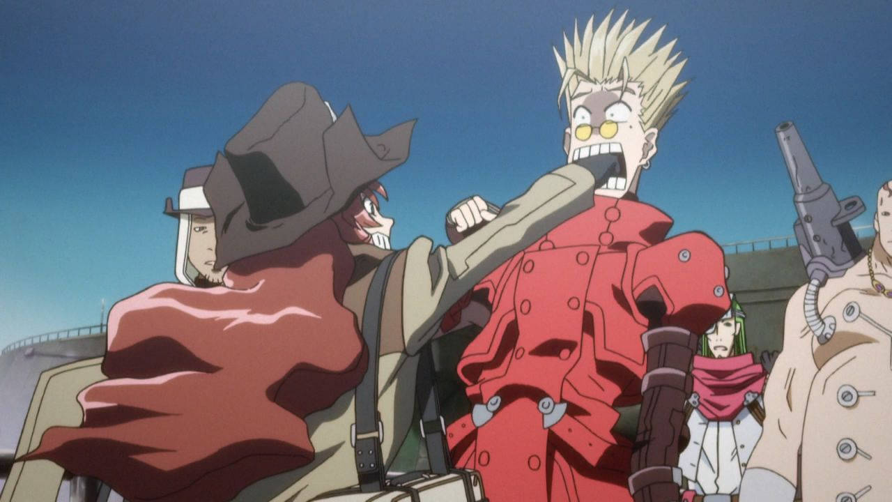 Trigun 桌布 壁紙 — 一個動漫場景顯示一個金髮男子穿著紅色外套，被一個戴著牛仔帽的面具人物踢到而大叫。