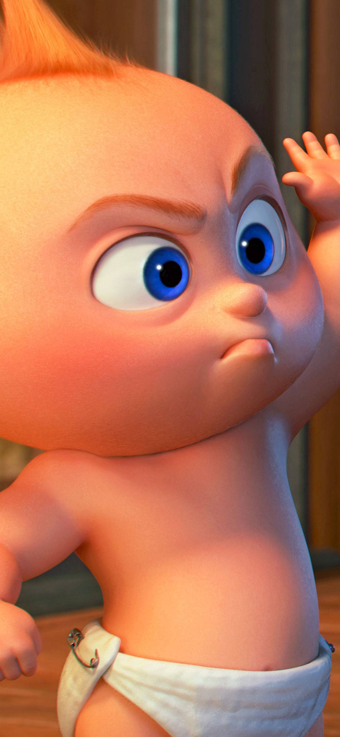 Jack Jack 桌布 壁紙 — 一個動畫嬰兒的特寫，擁有強烈的藍色眼睛和兇狠的怒容，穿著帶有銀色扣子的尿布。